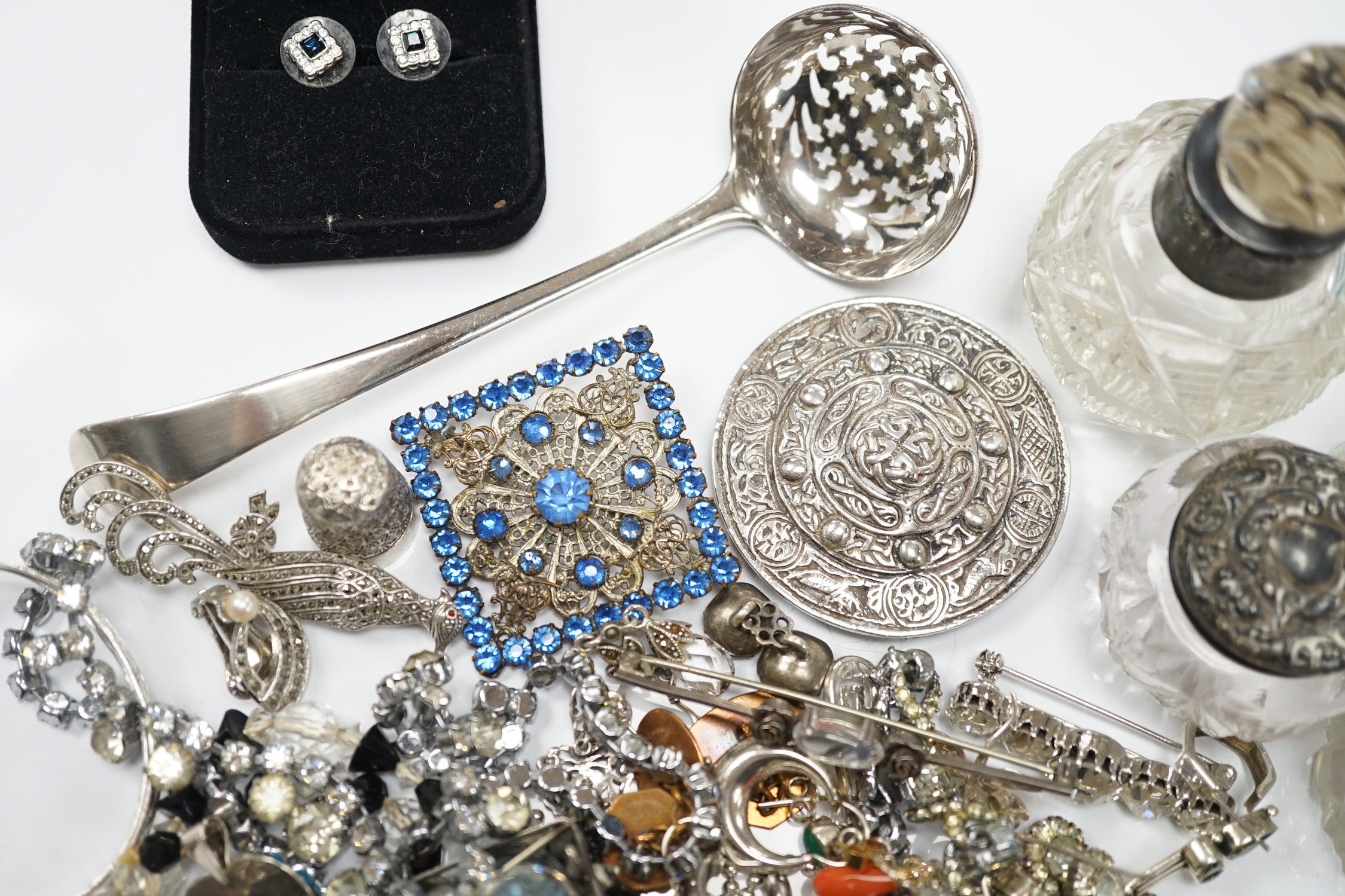 Sundry small silver including mounted glass toilet jars and a Georgian sifter spoon, together with assorted silver and other jewellery including earrings, pendants, brooches etc.
